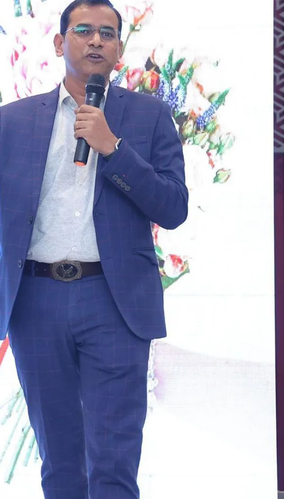 Raja Pantham, business growth consultant and speaker, on stage